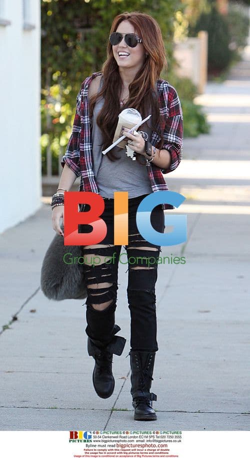 Miley Cyrus with Liam Hemsworth and Puppy