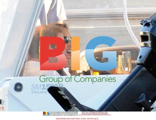 Prince William Flirts with Brunette