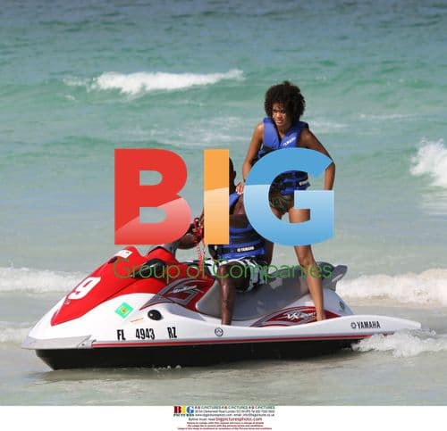 Salomon Kalou poses with fans on Miami beach