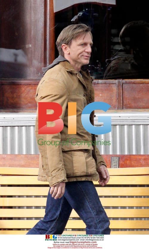 Daniel Craig Breaks Glass Window on Set