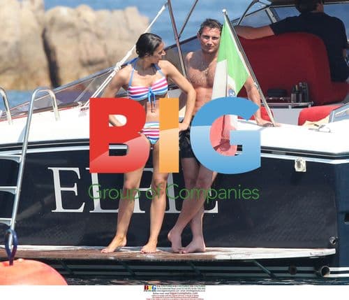 Frank Lampard and Christine Bleakley swim in Italy
