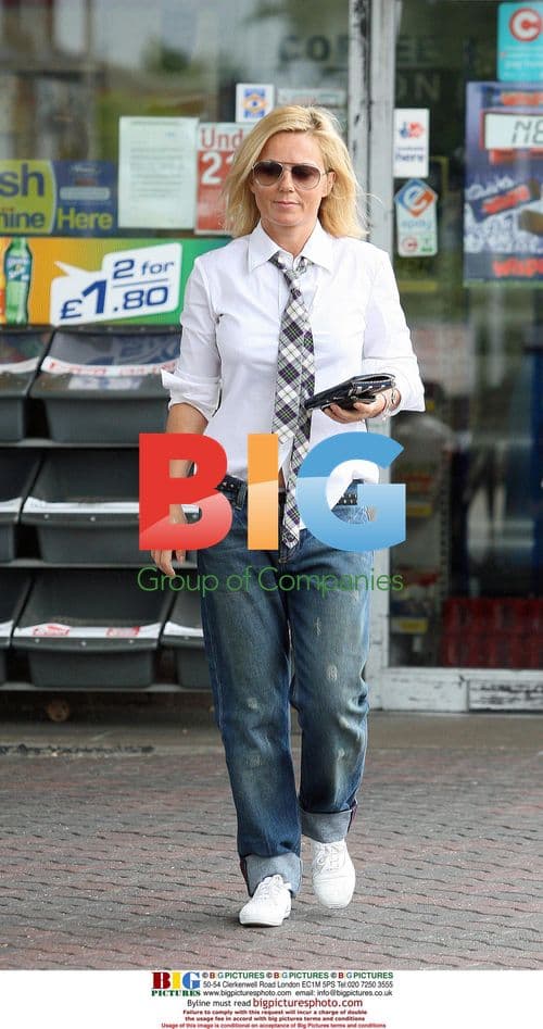 Geri Halliwell fueling car in London