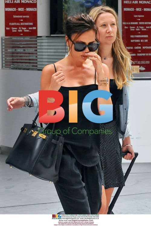 Victoria Beckham Hides Cold Sore at Airport