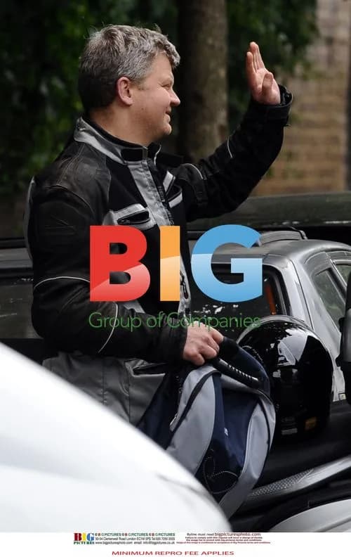 Adrian Chiles rides motorcycle without helmet