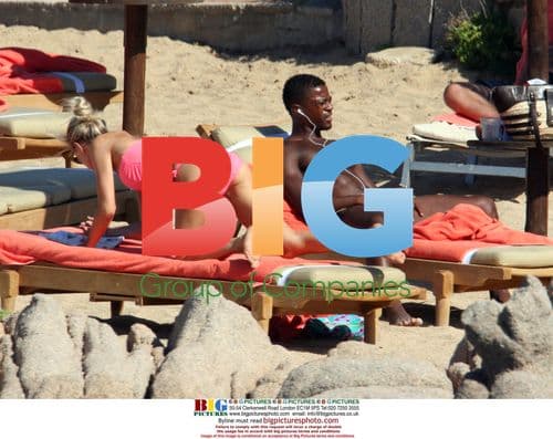 Patrice Evra Relaxes with Girlfriend