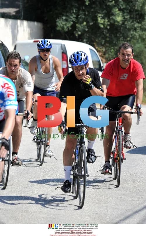 Nicolas Sarkozy Rides Bike to Pizza