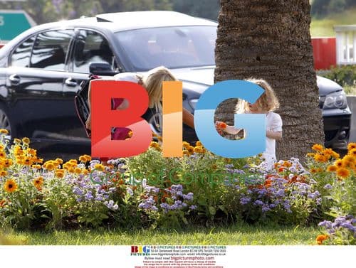 Geri Halliwell Arrives at Airport with Daughter Bluebell