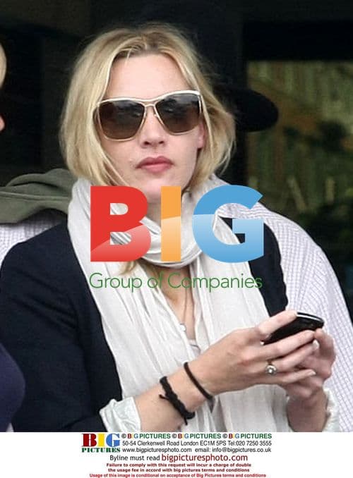 Kate Winslet Lands in Italy