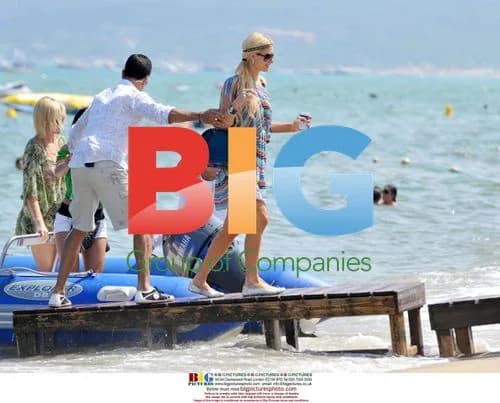 Paris and Nicky Hilton on a Boat to the Beach