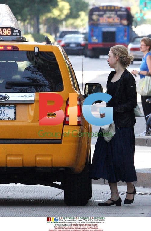 Chelsea Clinton Catches Cab After Workout