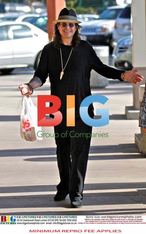 Ozzy Osbourne Leaves Drug Store with Enema