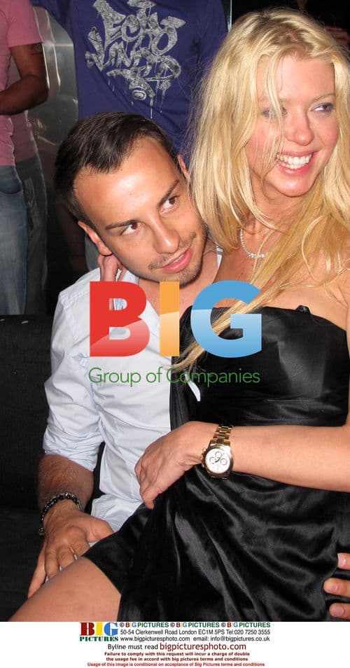 Tara Reid and Michael Axtmann at VIP Room in St. Tropez