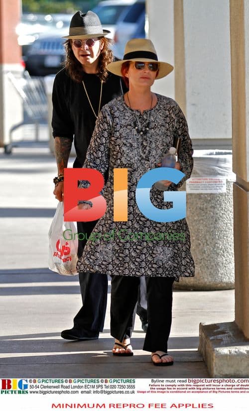 Ozzy Osbourne Leaves Drug Store with Enema