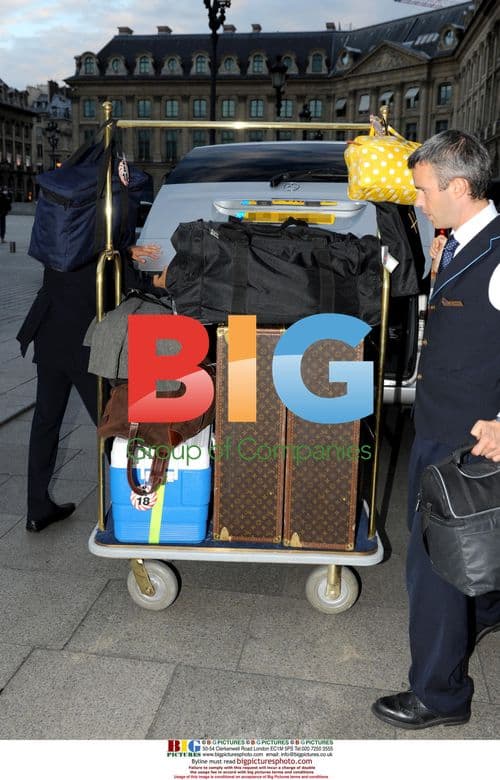 Madonna arrives at Ritz Hotel with Vuitton