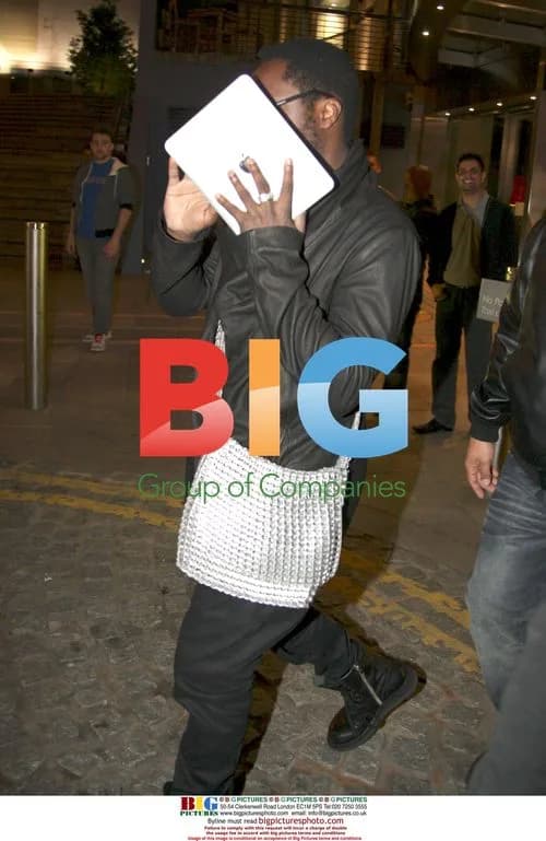Will.i.am leaving hotel for night out in Birmingham
