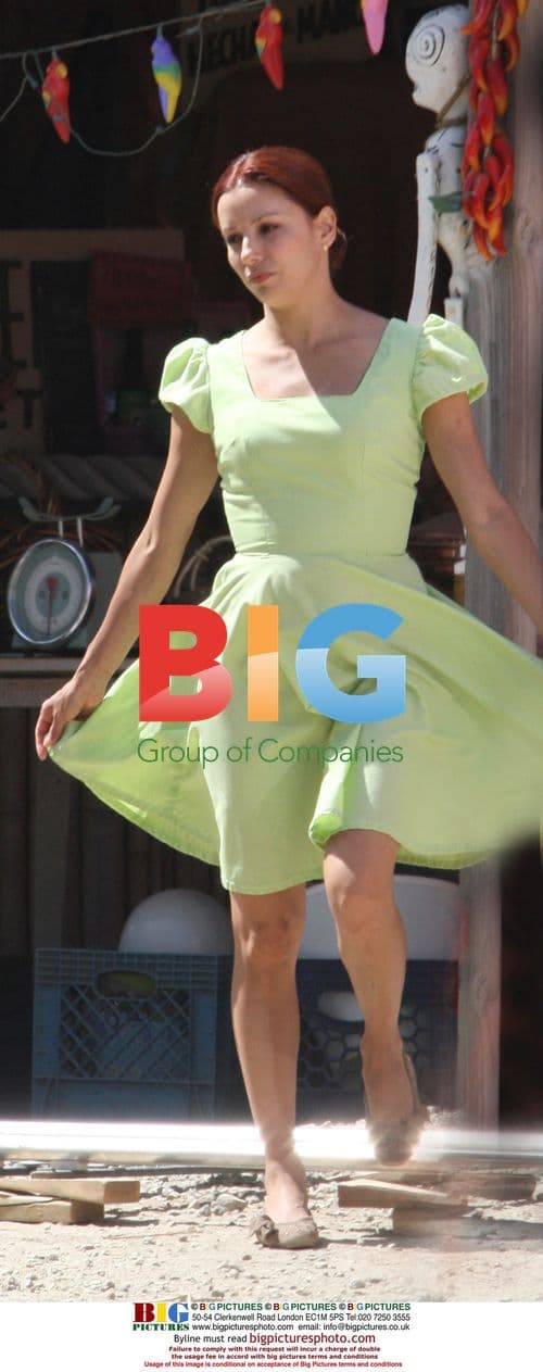 Eva Longoria films "Without Men" in lime green dress