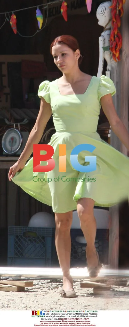 Eva Longoria films "Without Men" in lime green dress