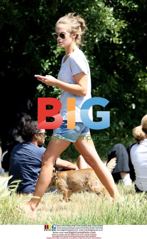 Kim Sears Walks Dog at Wimbledon