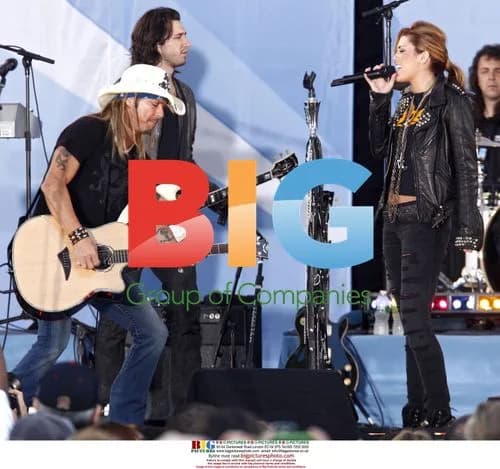Brett Michaels performs with Miley Cyrus