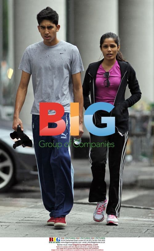 Freida Pinto and Dev Patel work out in Montreal