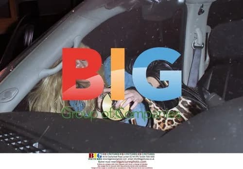 Lindsay Lohan Arrives at Party with Energy Drink