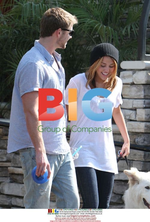 Miley Cyrus and Liam Hemsworth with dog