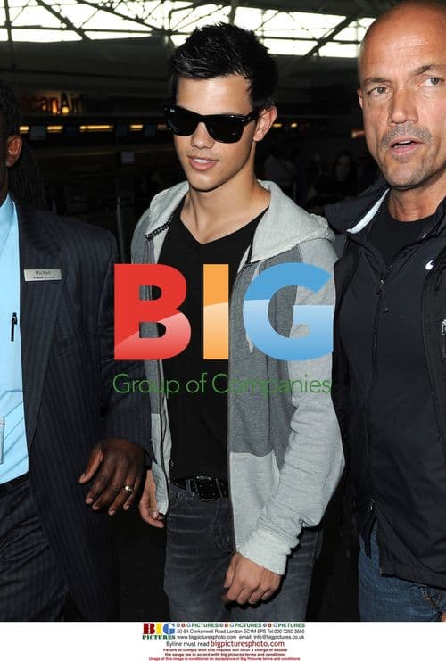 Taylor Lautner Arrives at JFK
