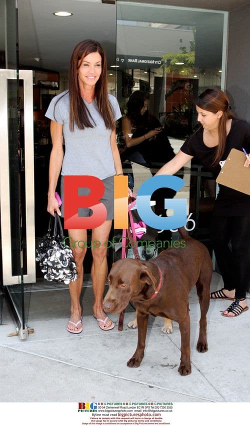 Janice Dickinson exits salon with dogs