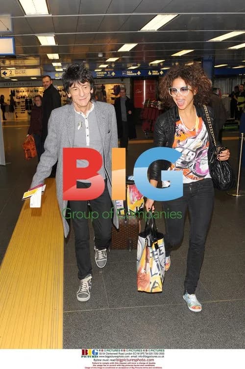 Ronnie Wood and Girlfriend at Airport