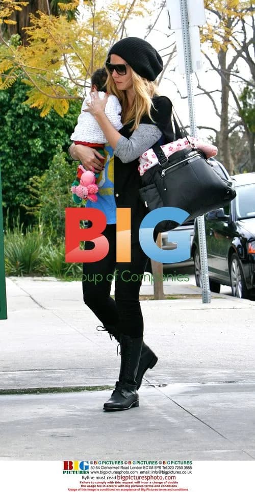 Heidi Klum with baby Lou at karate class