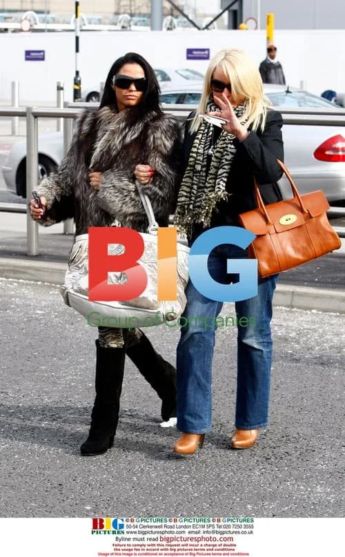 Katie Price Leaves Heathrow