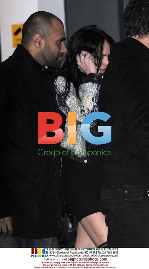 Lindsay Lohan Leaves Boujis with Mystery Men