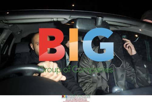 Lindsay Lohan Leaves Boujis with Two Men