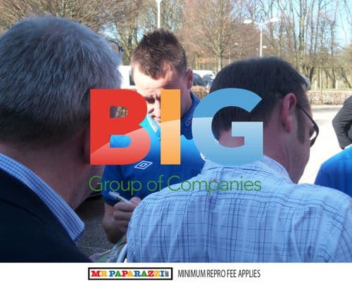 John Terry signs autograph