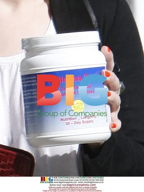 Kelly Osbourne with Vitamin Supplements