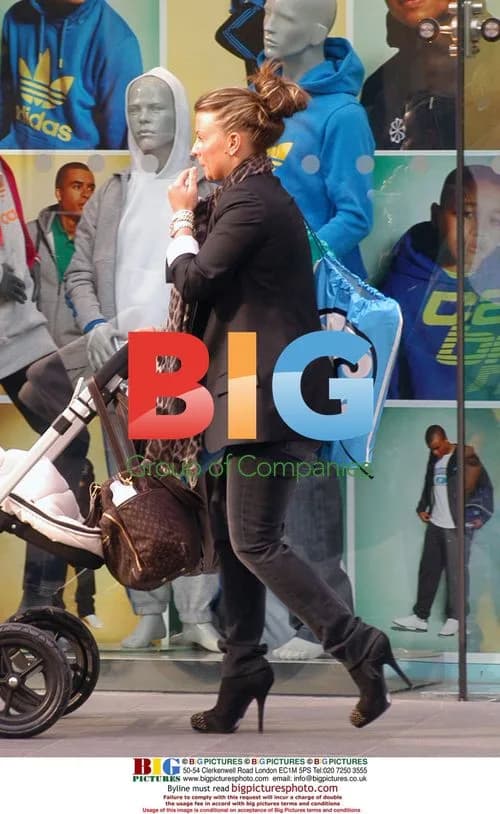 Coleen Rooney out shopping with baby Kai