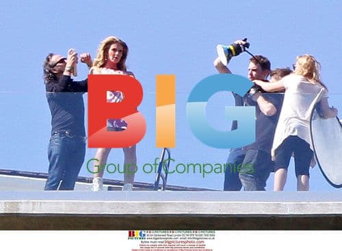 Heidi Klum in Colorful Garments at Hollywood Mansion