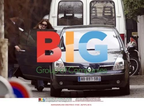 Carla Bruni Sarkozy picks up son from school