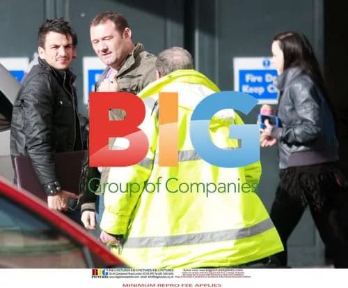 Peter Andre Greets Mystery Brunette