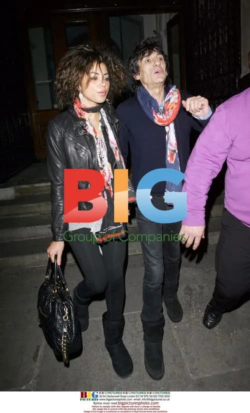 Ronnie Wood and Girlfriend at Art Auction