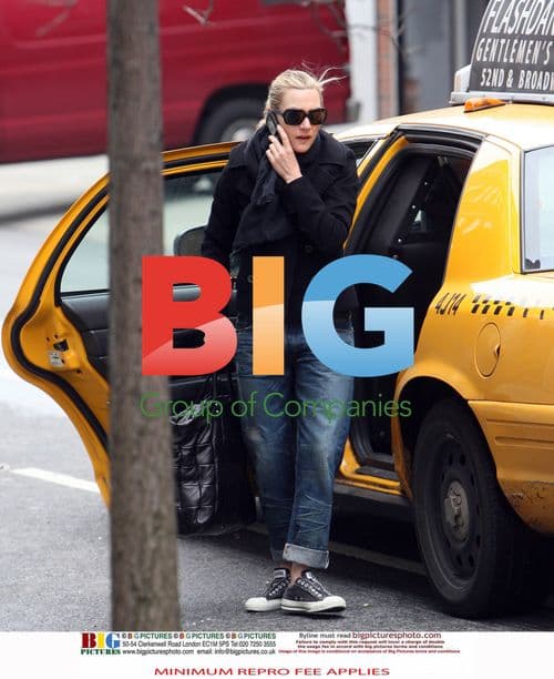 Kate Winslet Exits Taxi in NYC