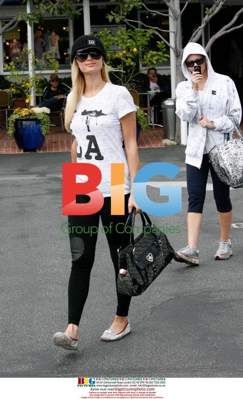 Paris Hilton Wearing 'I Gun LA' T-shirt