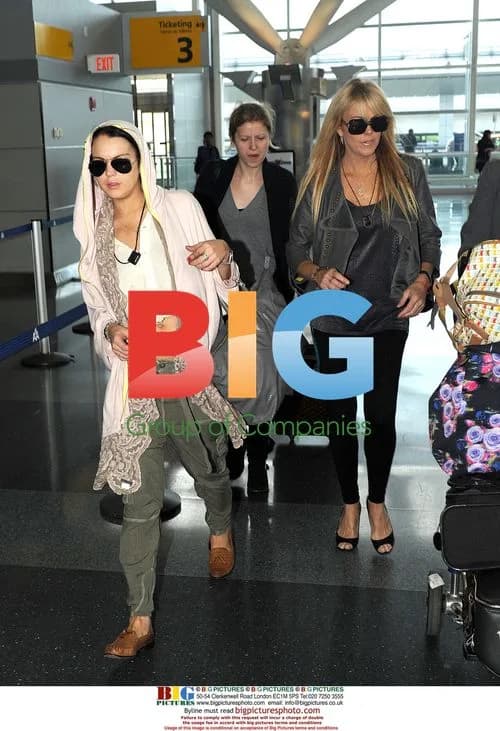 Lindsay Lohan and Dina Lohan at JFK Airport