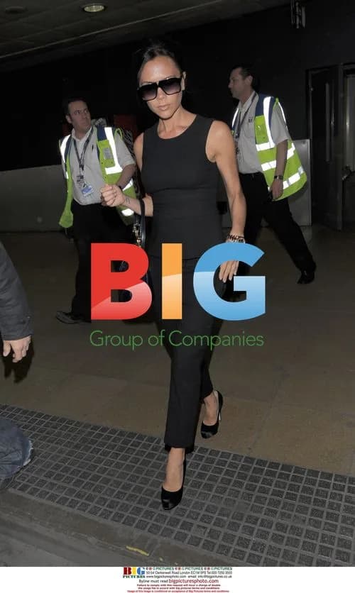Victoria Beckham Arrives at Heathrow