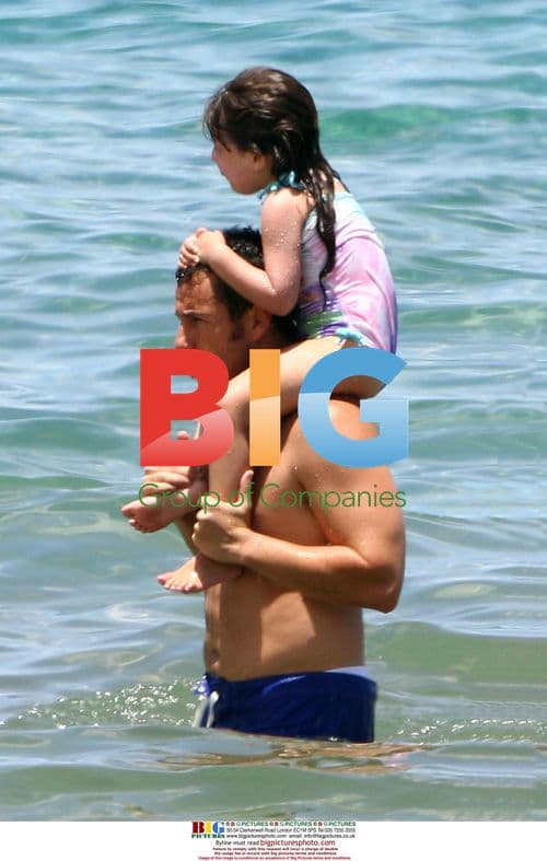 Adam Sandler and daughter on the beach
