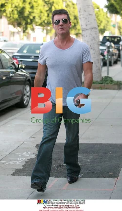 Simon Cowell and Mezhgan Hussainy Shop for New Car