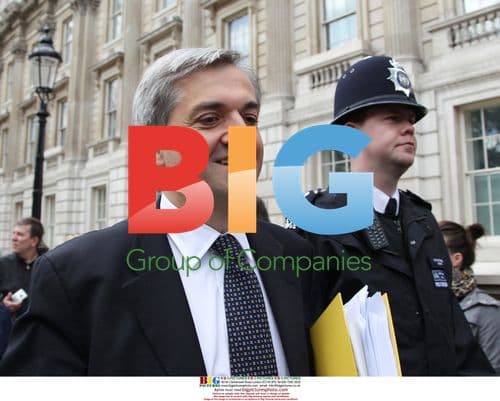Chris Huhne Arrives at Cabinet Offices