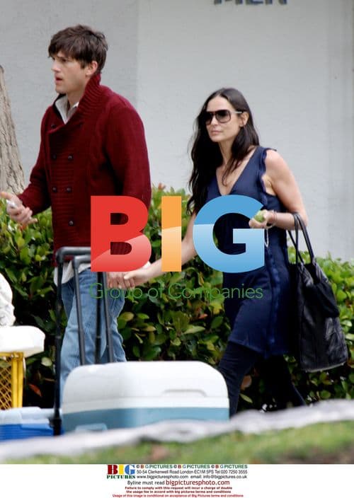 Ashton Kutcher and Demi Moore on set