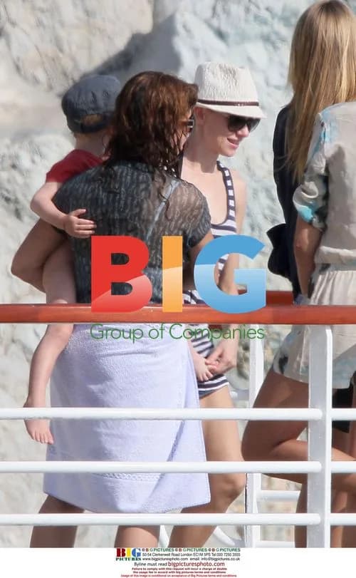 Naomi Watts Relaxes with Children at Pool