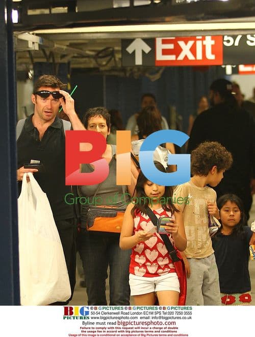 Hugh Jackman picks up kids